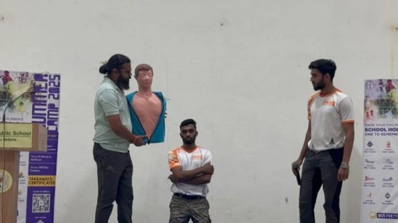 Students practicing CPR on mannequins during classroom session