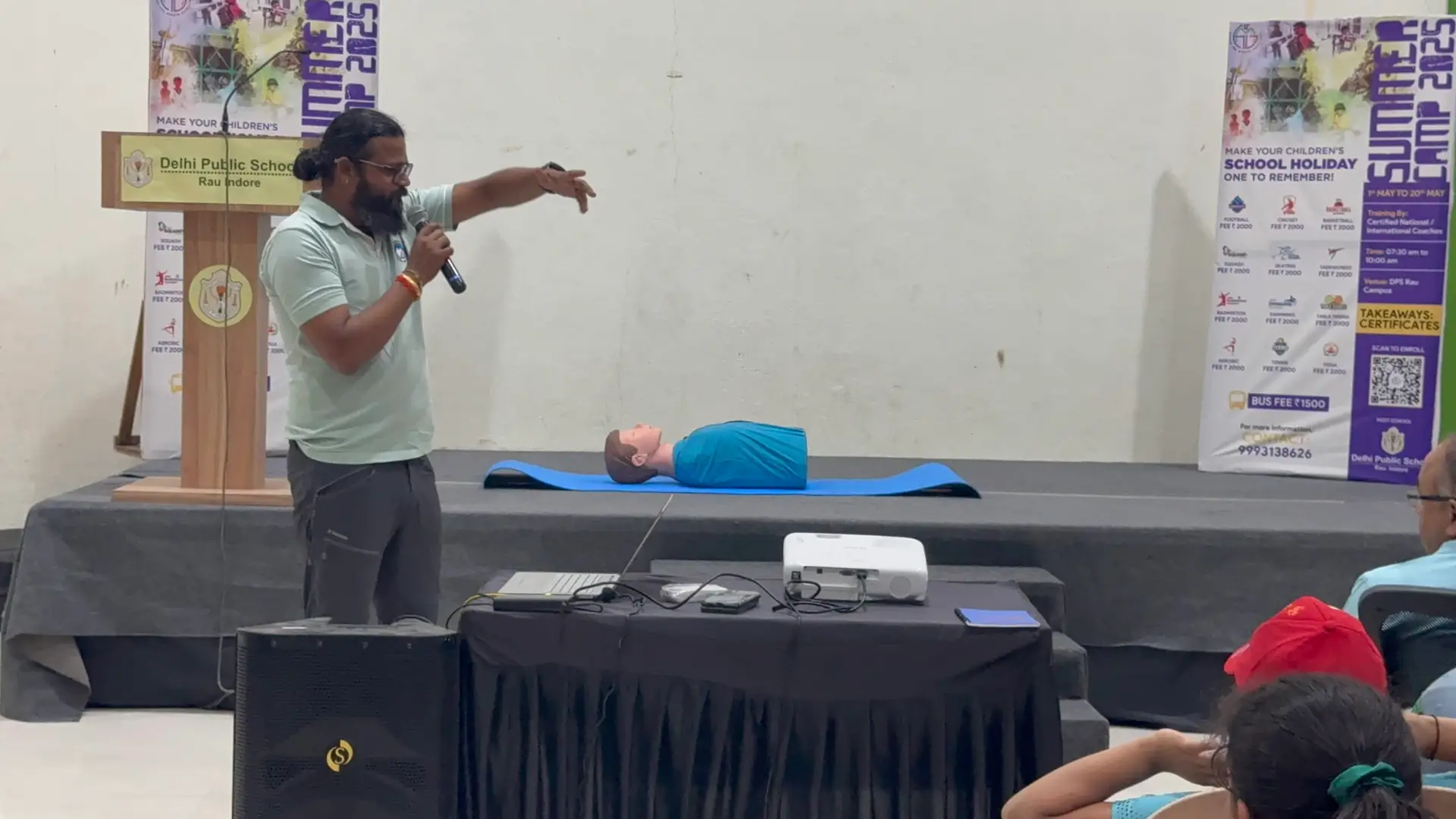 DPS Rau students learning chest compressions