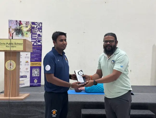 Students actively participating in CPR training at DPS Rau.