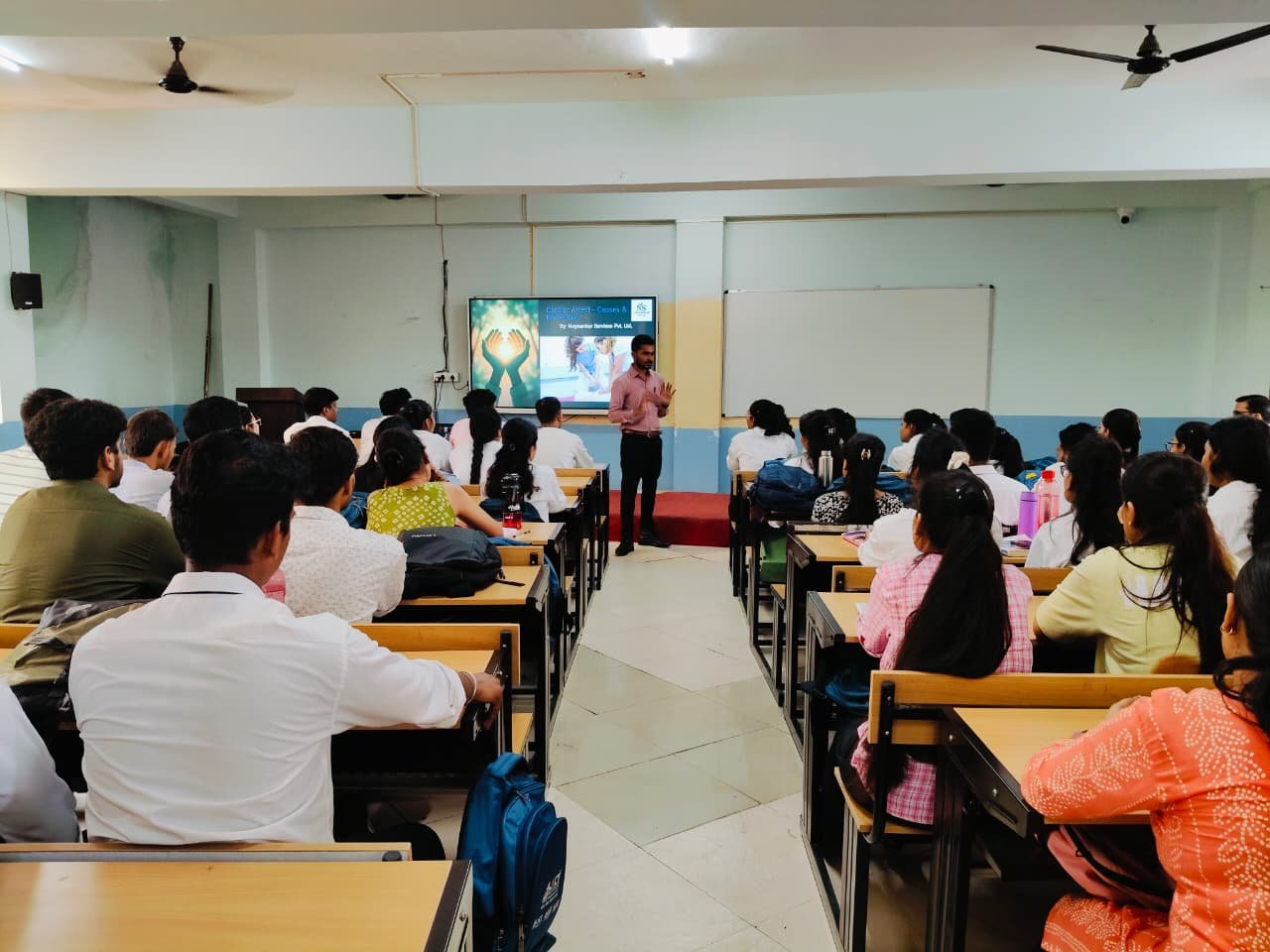 Nayaankur professional trainers mentoring students in classroom.