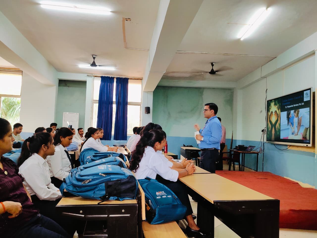 Trainer demonstrating CPR technique in classroom at LNCT Bhopal